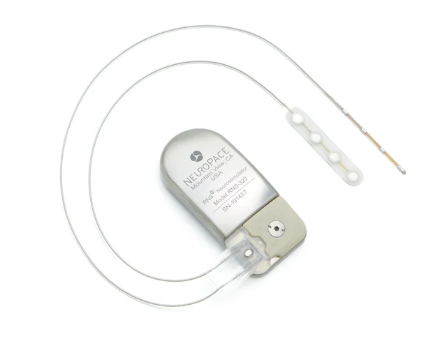 RNS-320 implant connected to a four-contact cortical strip and cylindrical depth lead.