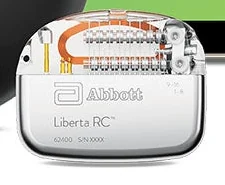 Liberta RC implant with a titanium housing and transparent multi-contact lead connector header.