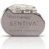 Rounded SenTiva implanted generator with a transparent connector header.